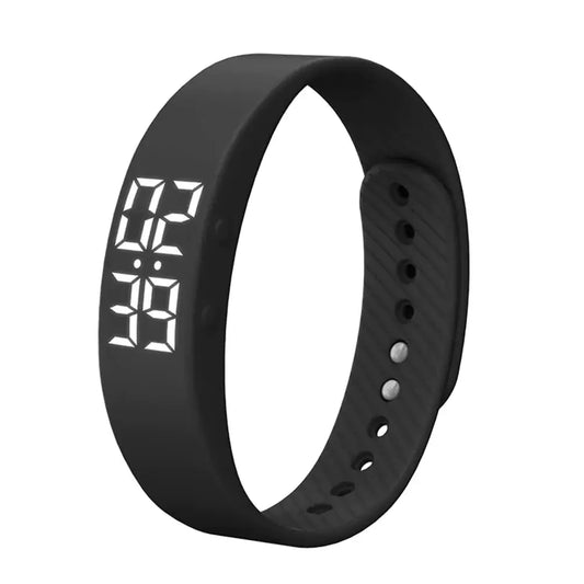 Reloj inteligente negro con pantalla digital mostrando la hora en formato 24 horas.